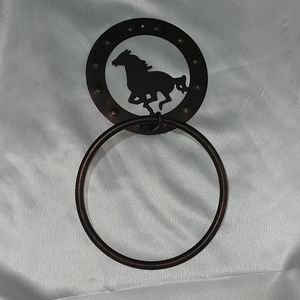 Metal towel rack Horse ring in copper finish.